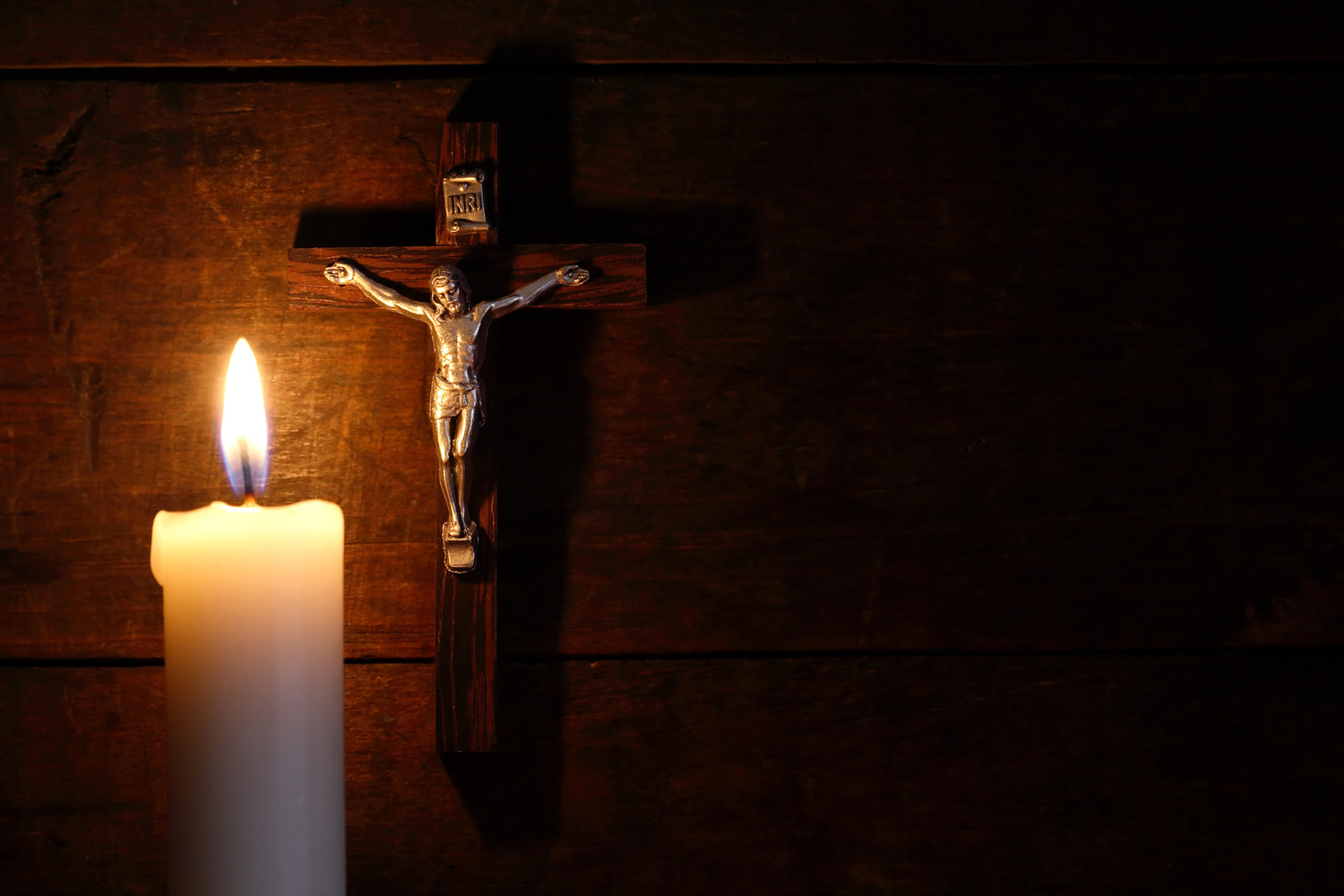 Why do Catholics, Orthodox, Anglicans, and some Protestants display crucifixes?